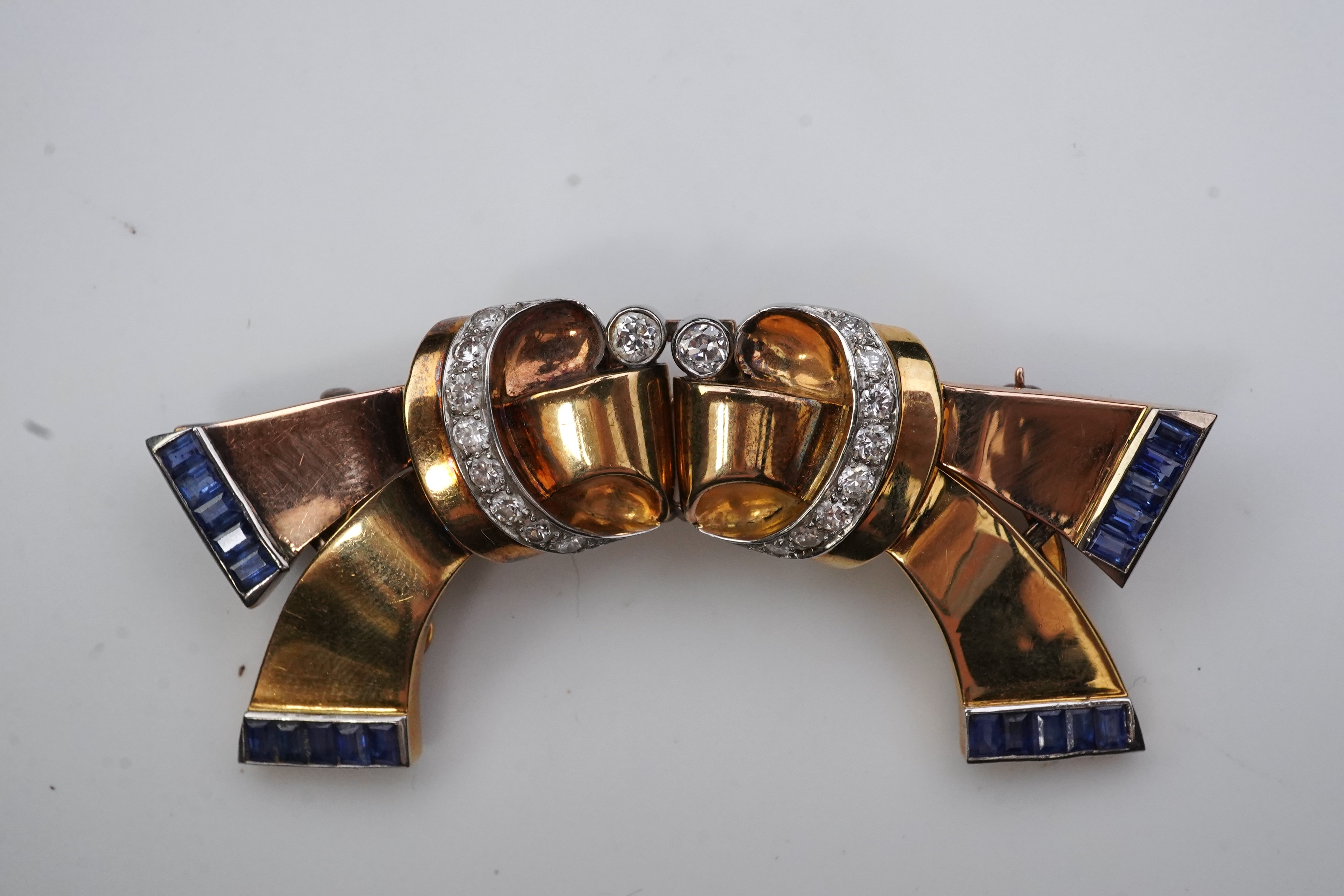 A Retro gold, sapphire and diamond double clip brooch, circa 1940